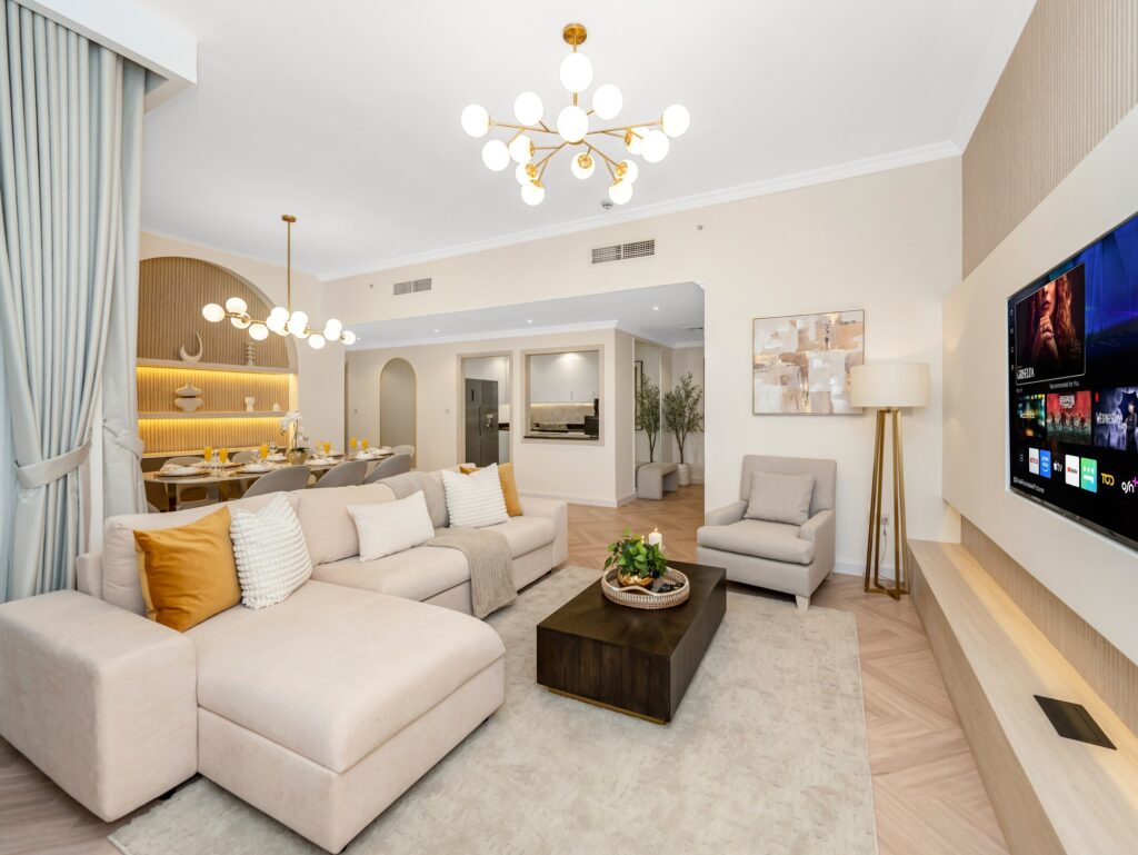Furnished open-plan living and dining room in a Royale Stays managed apartment in Sadaf, JBR, Dubai