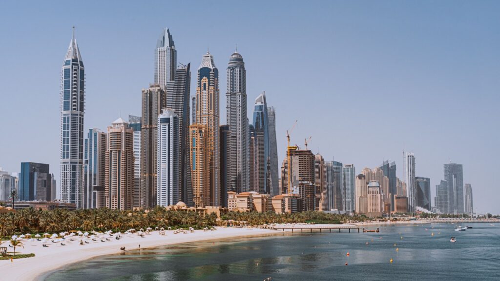 Beachfront JBR/Dubai Marina skyline of high-rise towers seen from the water on a clear day