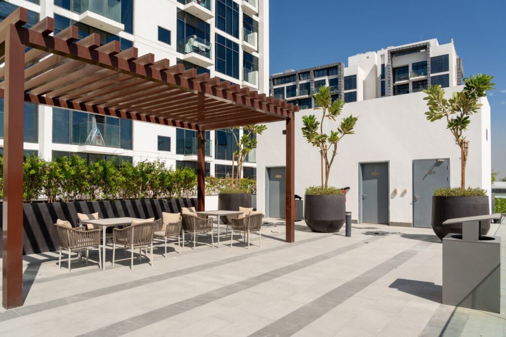 Landscaped rooftop terrace with pergola near Belgravia Heights 1, JVC, Dubai