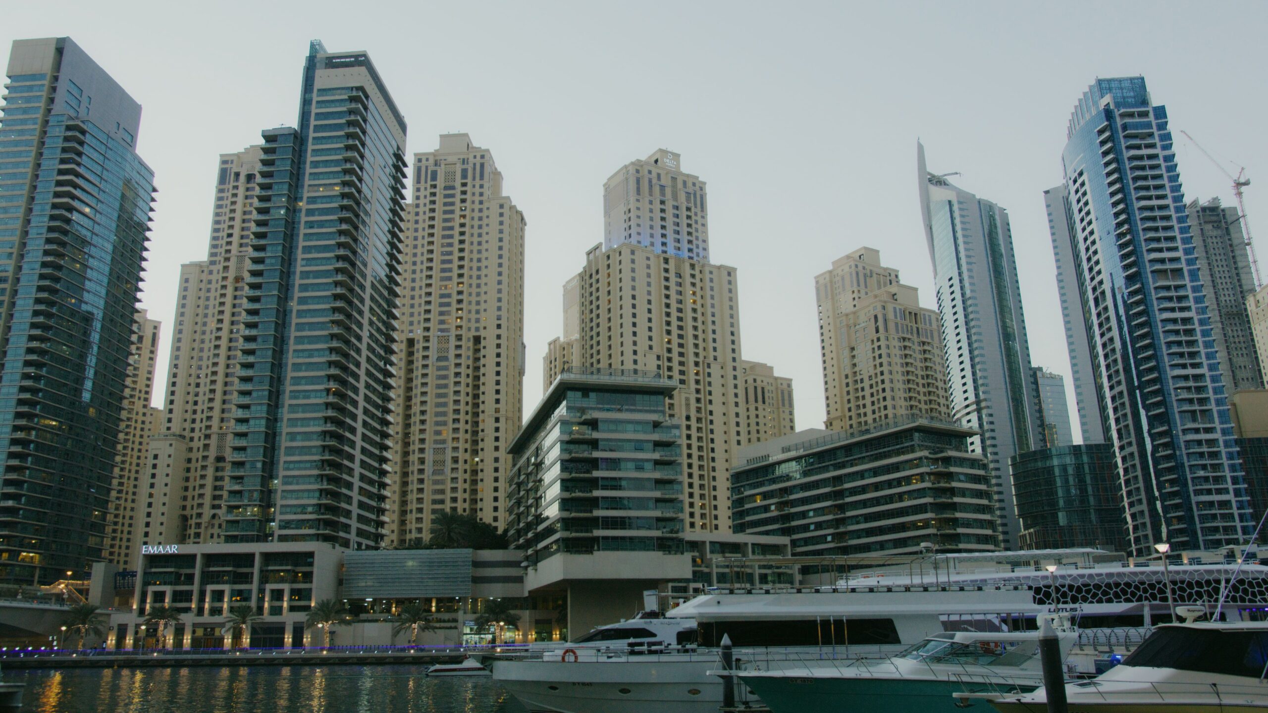 Dubai Marina apartment tower skyline near the water at dusk, no people visible