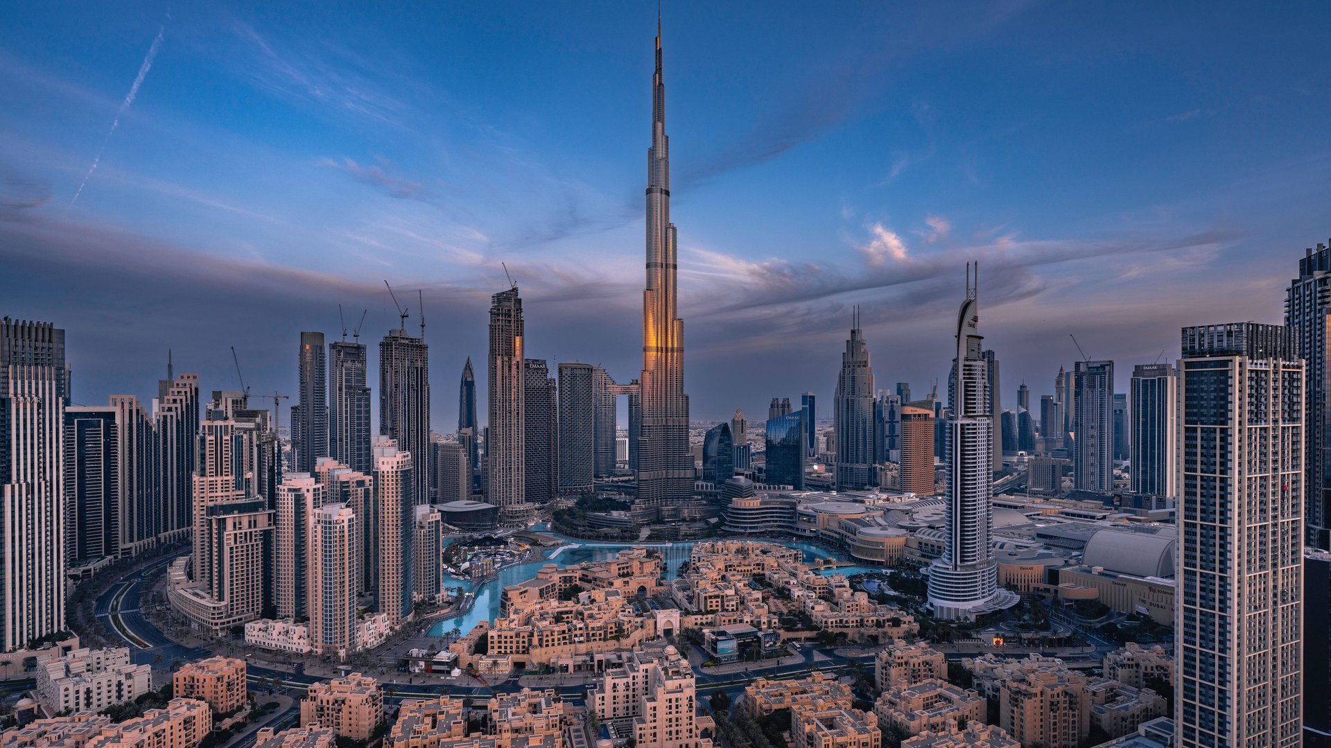 Dubai skyline with Burj Khalifa at twilight, no people visible