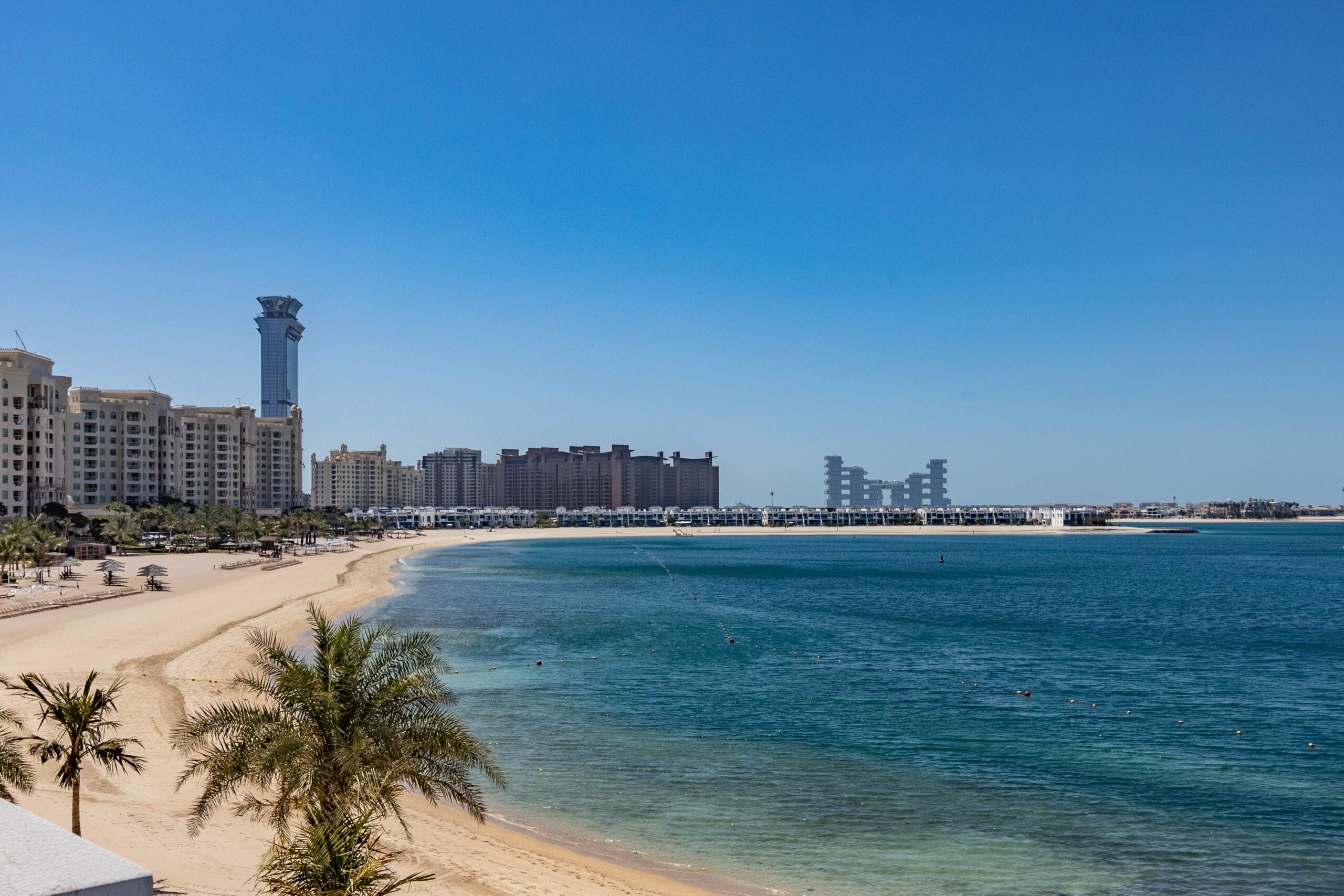 Elevated view of a Palm Jumeirah frond villa row along the beach, Dubai