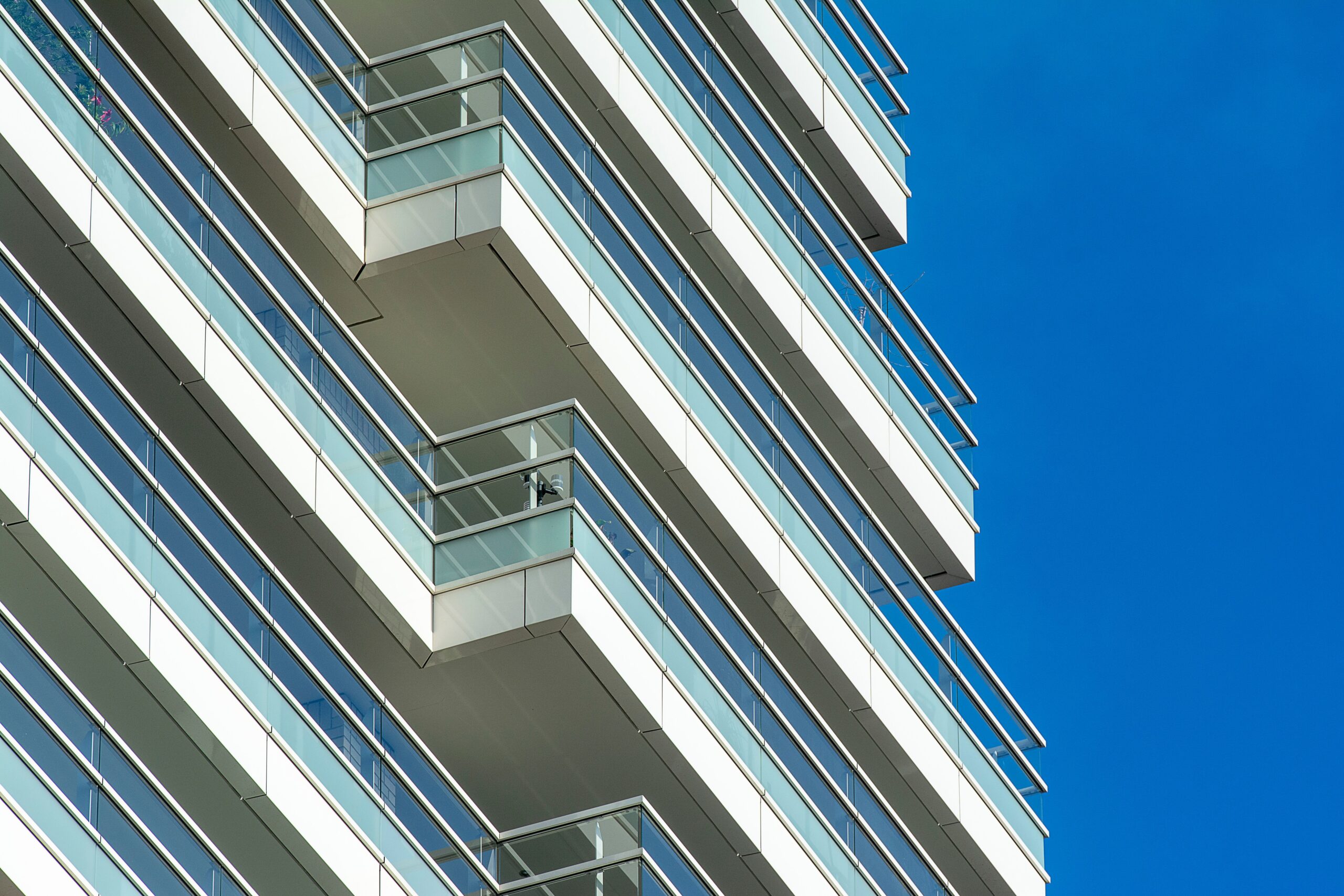 Modern glass balcony facade of a high-rise tower in Dubai Marina, near LIV Marina