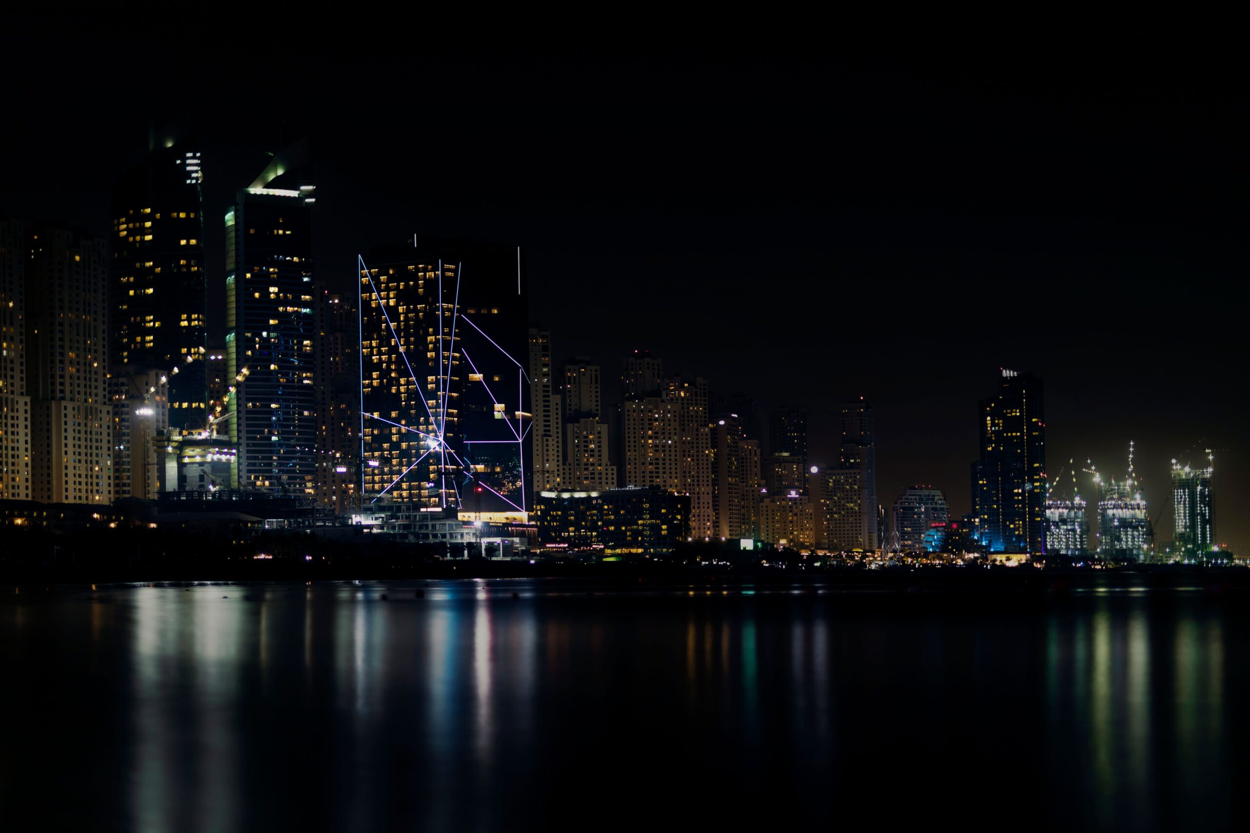Night skyline over Dubai Harbour near Sunrise Bay Tower 2, Emaar Beachfront