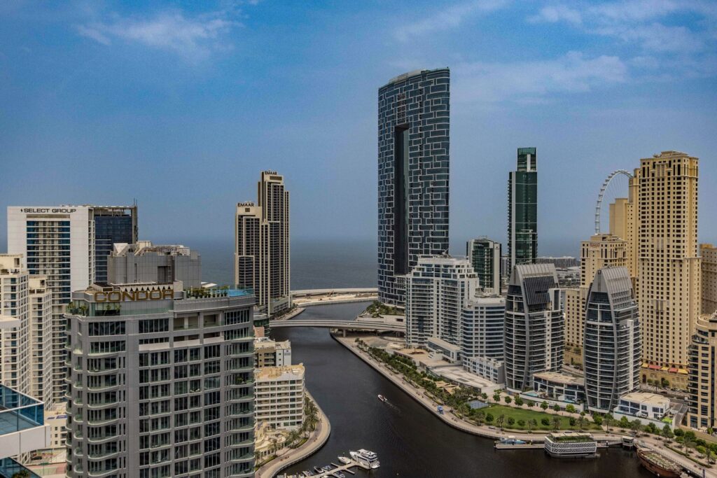 Modern residential tower in Dubai Hills Estate with landscaped surroundings