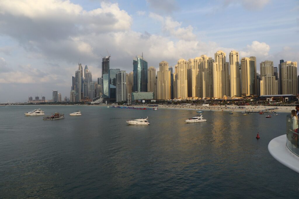 Scenic daytime view of modern high-rise waterfront towers on Dubai's skyline