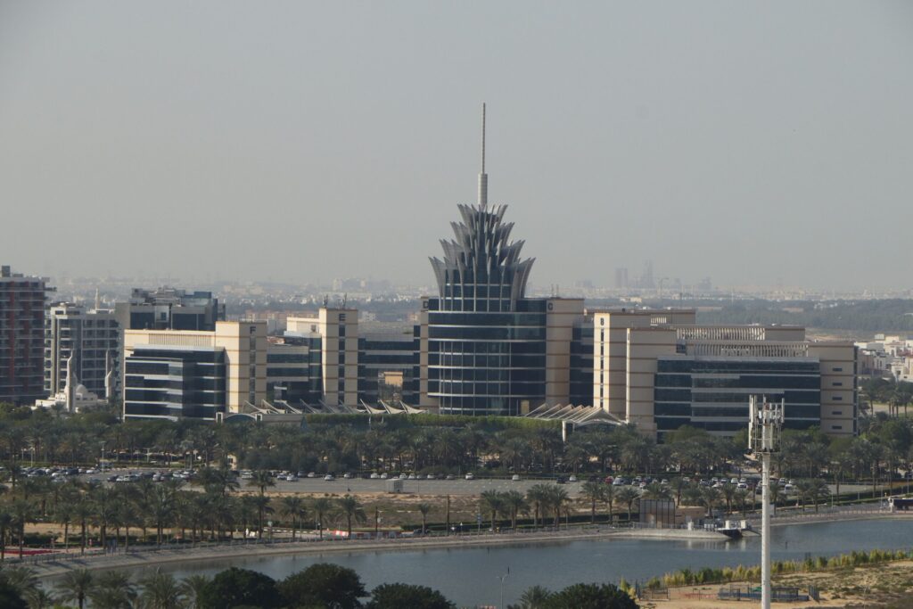 Distinctive crown-topped Dubai Silicon Oasis Authority building near Binghatti Stars