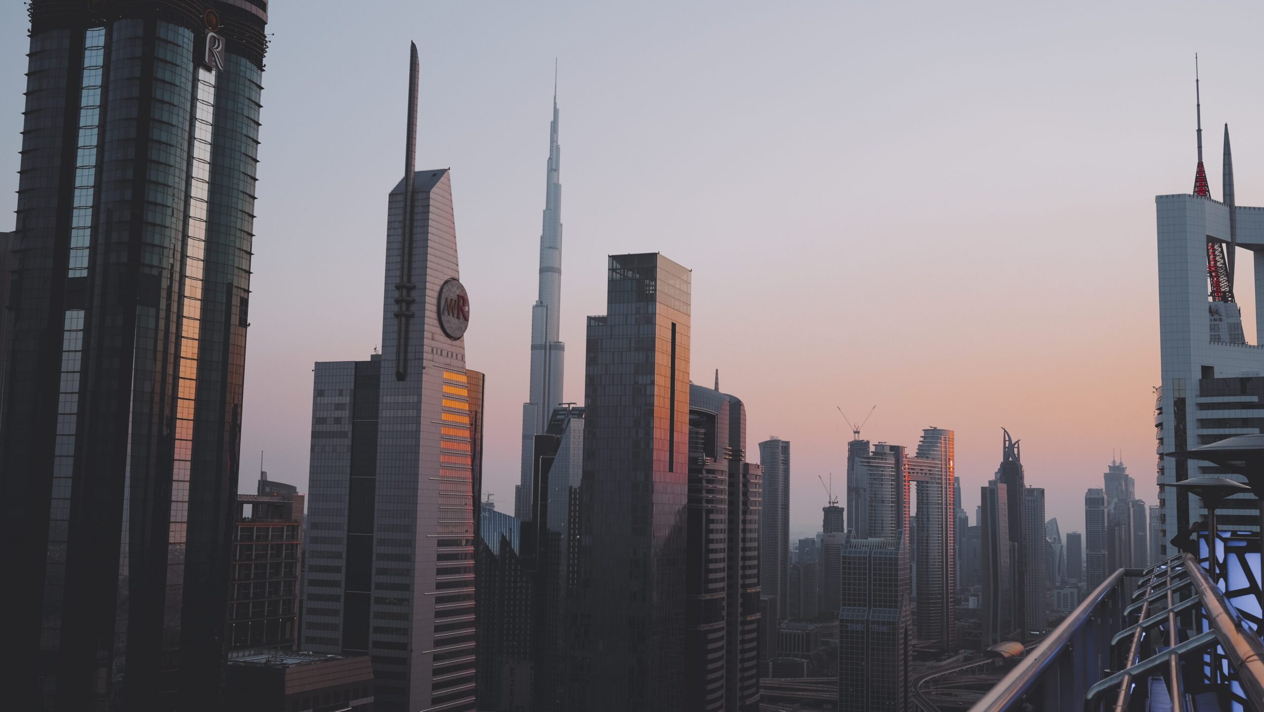 Downtown Dubai skyline with the Burj Khalifa at sunset