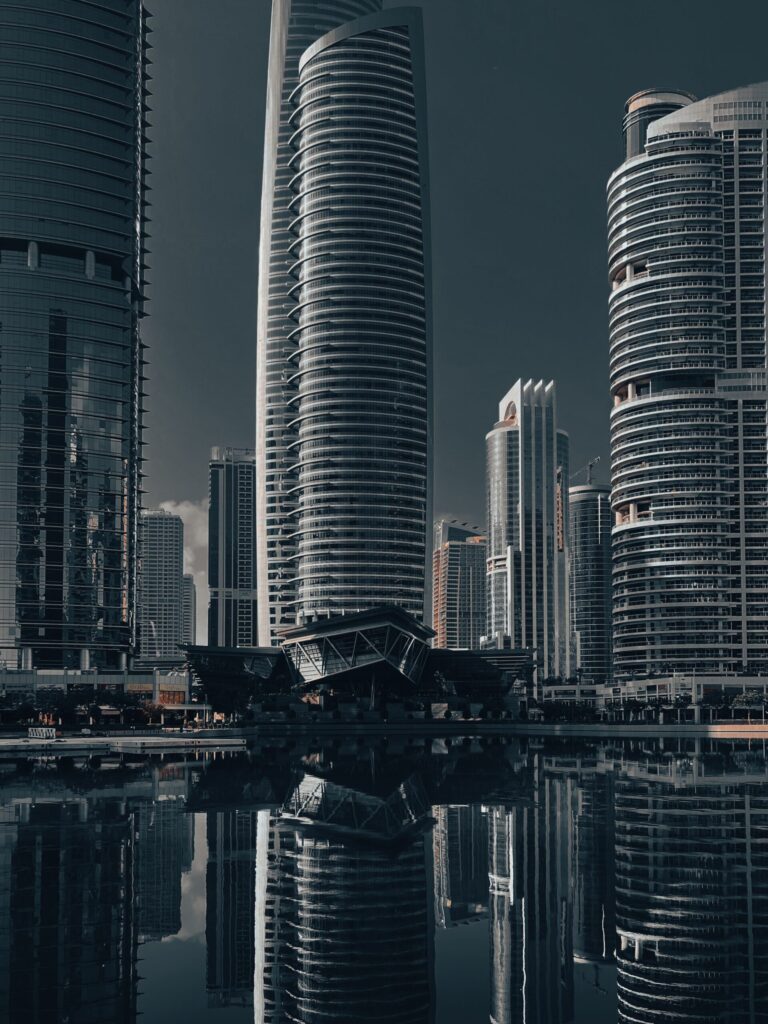 Skyline view of Jumeirah Lake Towers with lake reflections in Dubai