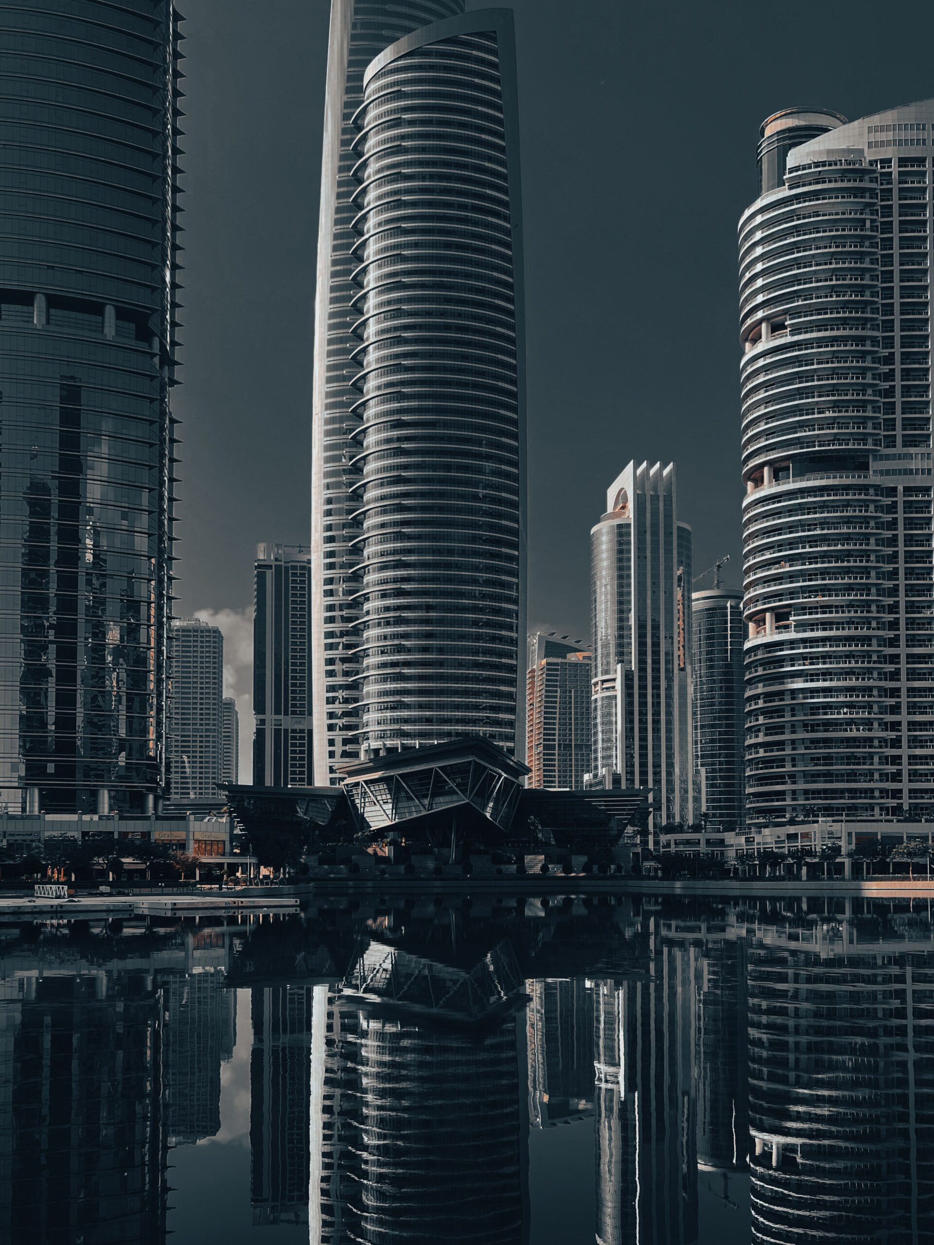 Skyline view of Jumeirah Lake Towers with lake reflections in Dubai