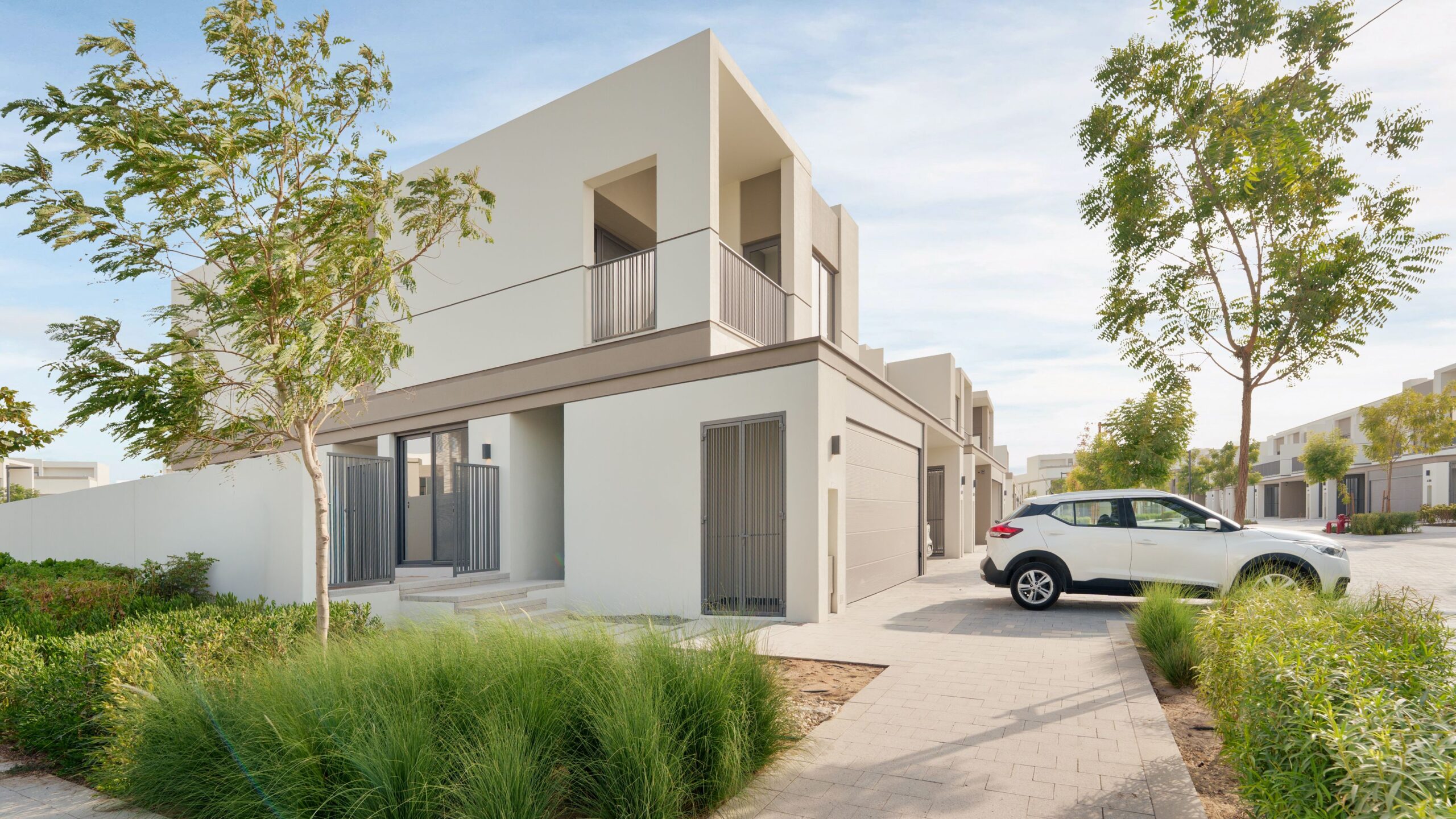 Modern minimalist Dubai townhouse with driveway and garden near Westar Azure, JVC