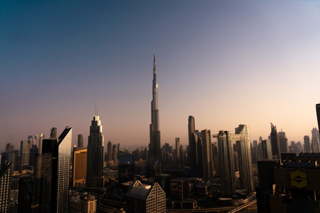 Dubai skyline at sunset with Burj Khalifa towering over Downtown Dubai