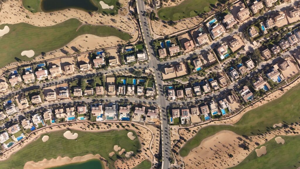 Aerial view of a golf-course villa community in Dubai Hills Estate, representative of Sidra Villas