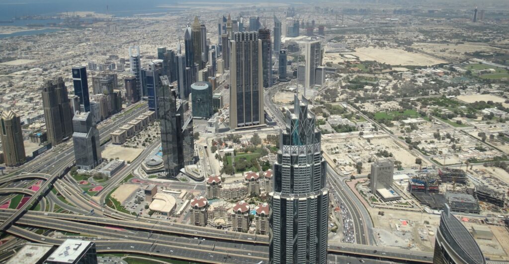 Aerial view of Dubai skyscrapers and highway interchanges along Sheikh Zayed Road
