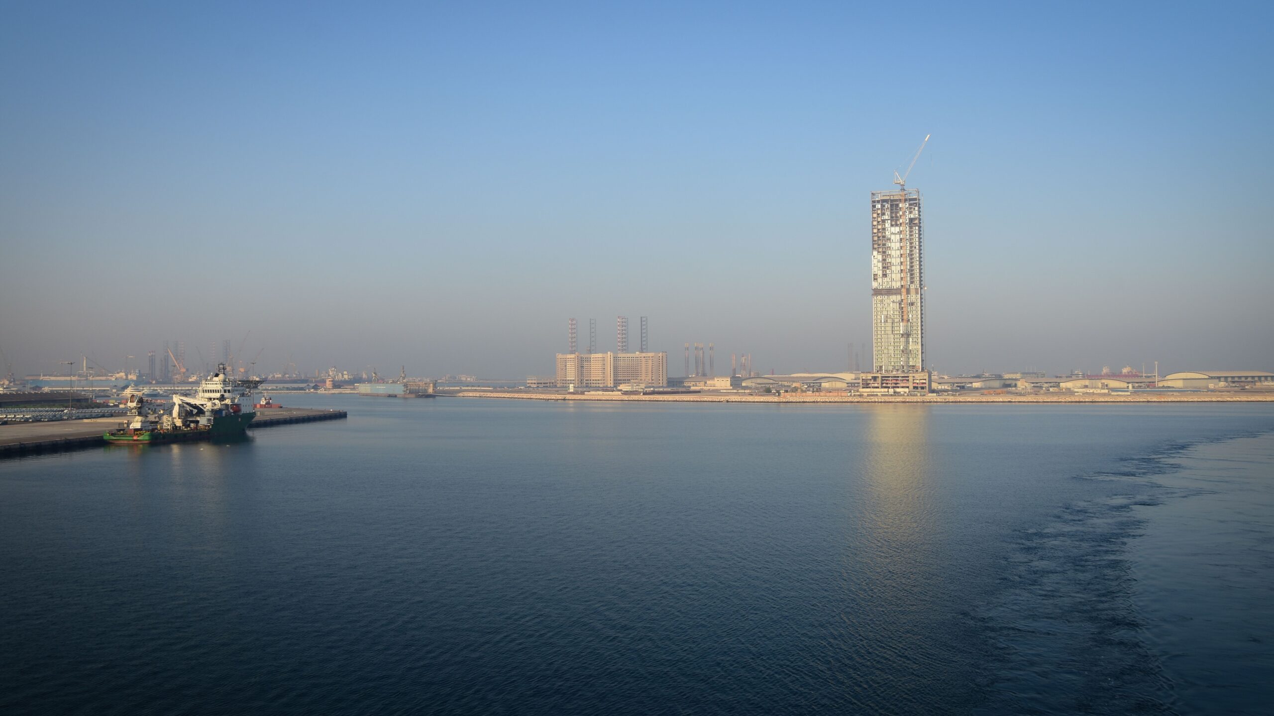 Residential tower under construction on a Dubai waterfront, near Lyvia by Palace, Dubai Creek Harbour