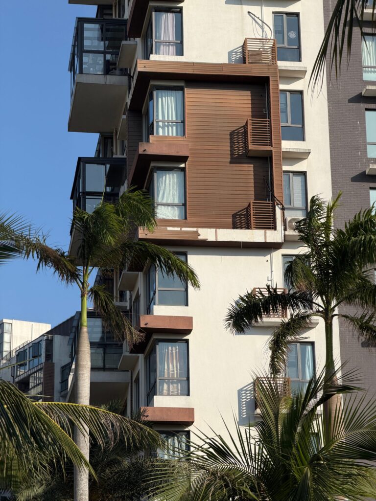 Modern apartment building facade with cantilevered balconies near Golden Mile 3, Palm Jumeirah