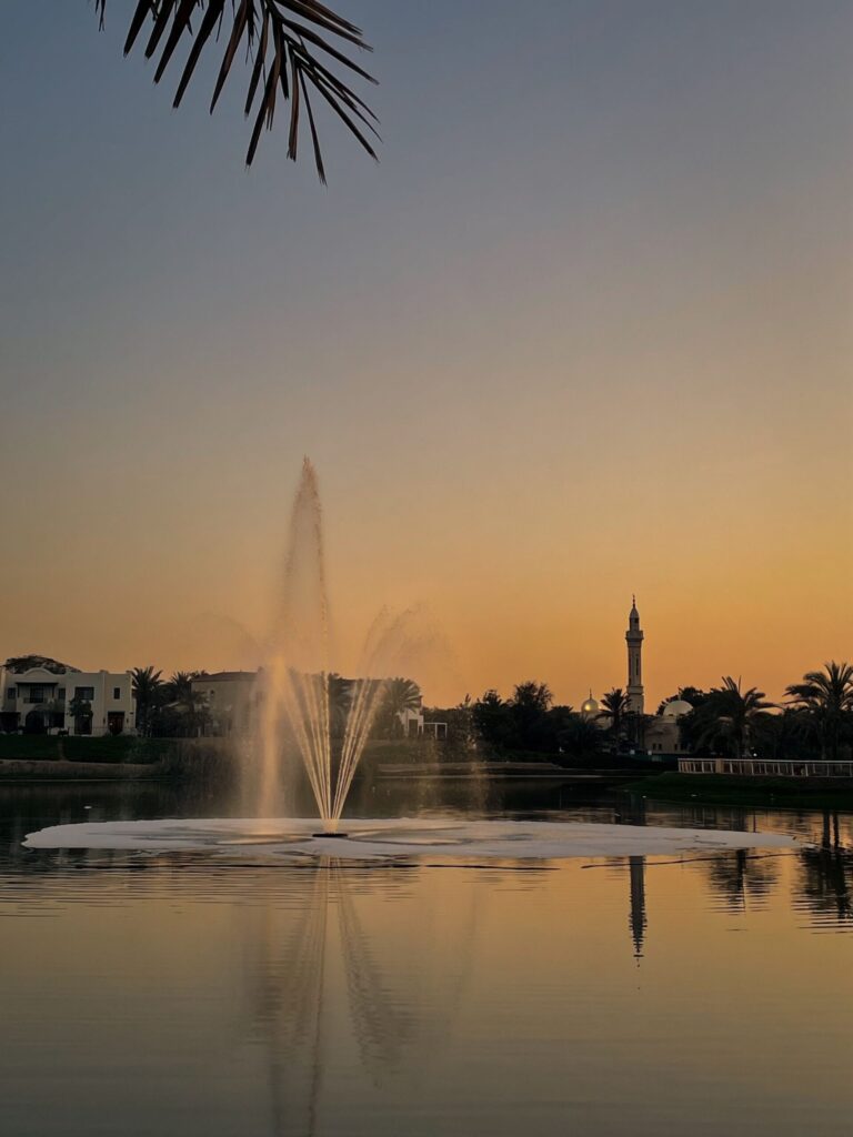 Community lake at sunset in a Dubai villa community near Springs 9