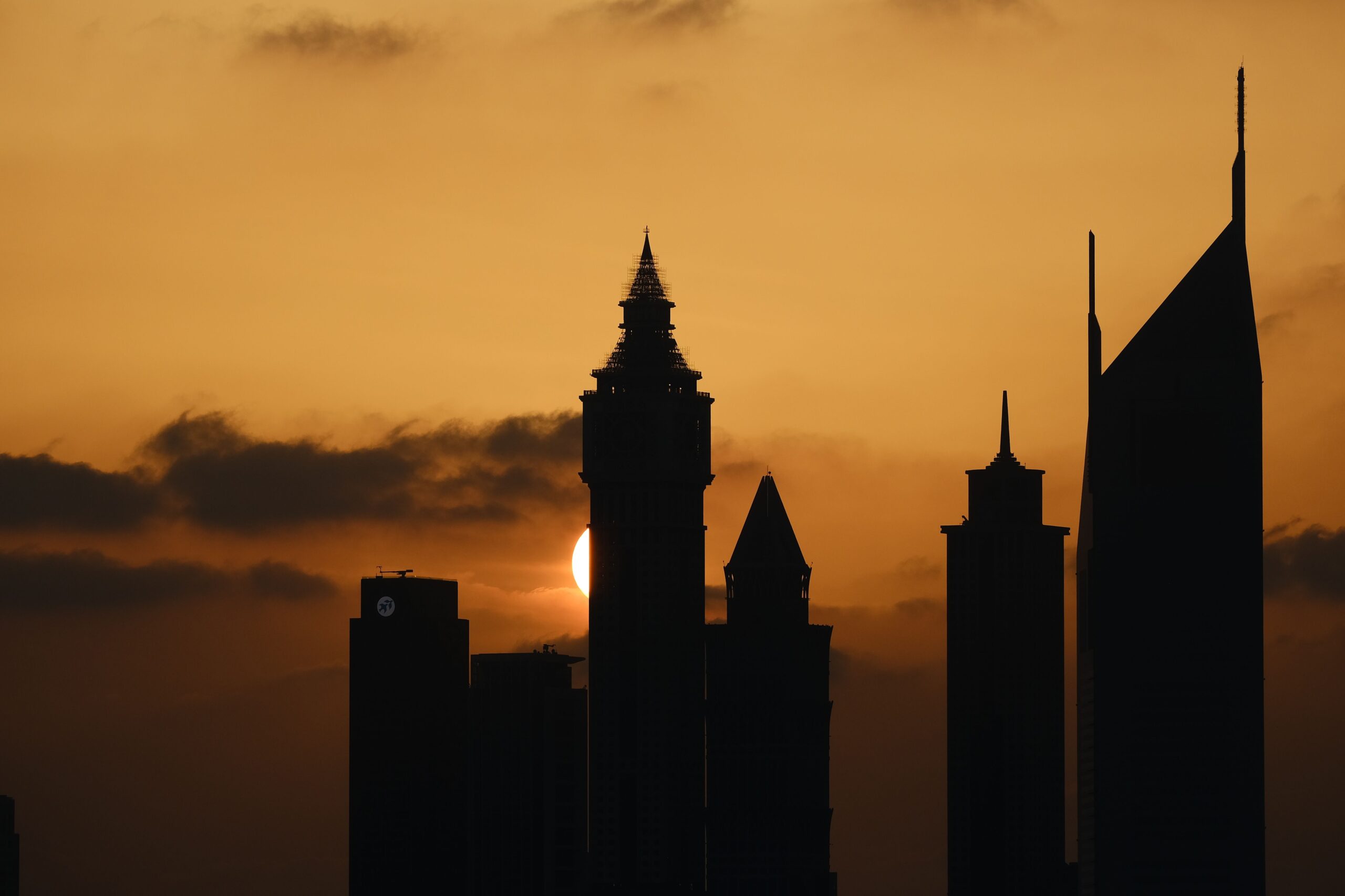 Dubai skyline silhouette at sunset, Business Bay
