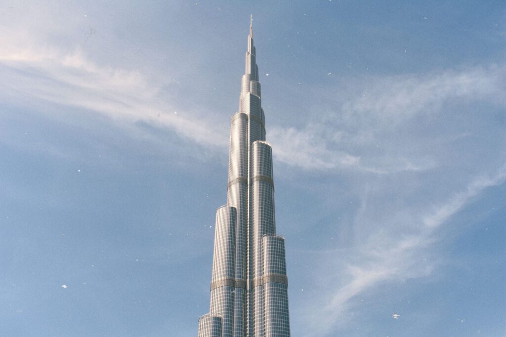 Burj Khalifa and the Downtown Dubai skyline in daylight, near Fairmont Residences Solara Tower