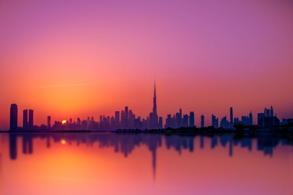 Downtown Dubai skyline silhouette at sunset near The Address Sky View Tower 2