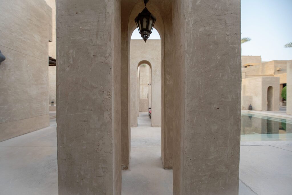 Sandstone Arabian-style archway and courtyard, evocative of Old Town Downtown Dubai, near Zanzebeel 3